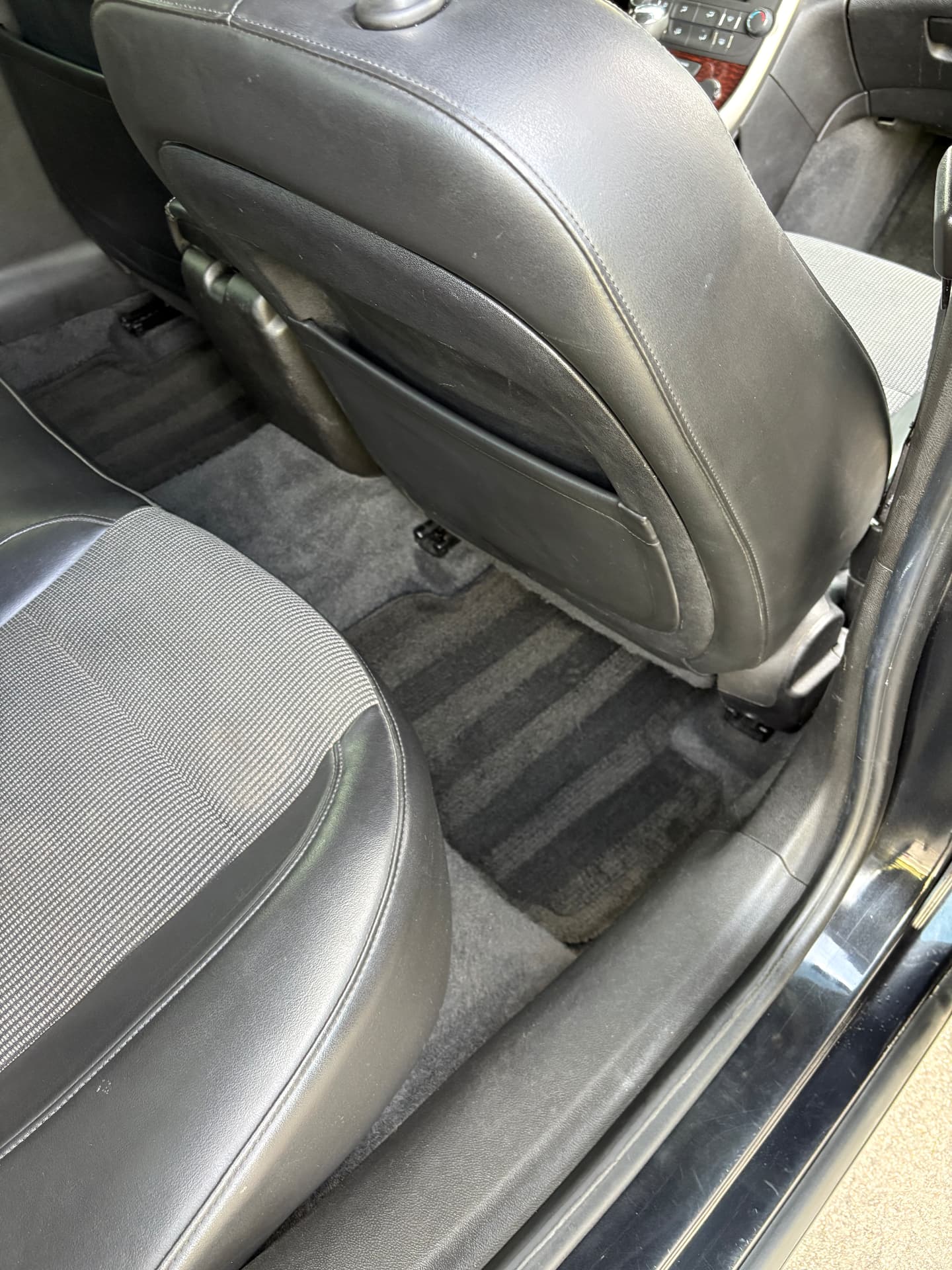 Cleaned rear seats and freshly extracted carpet in a sedan