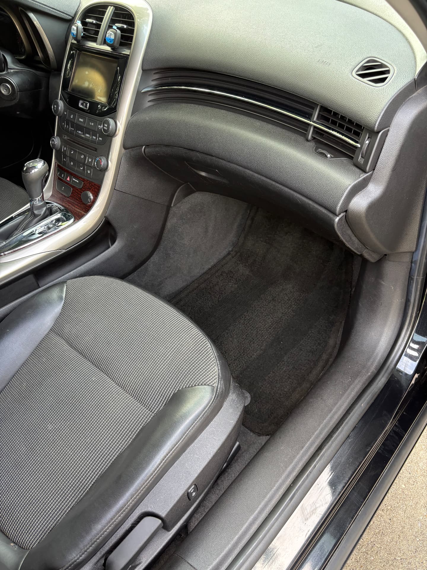 Clean passenger footwell, dashboard, and door trim
